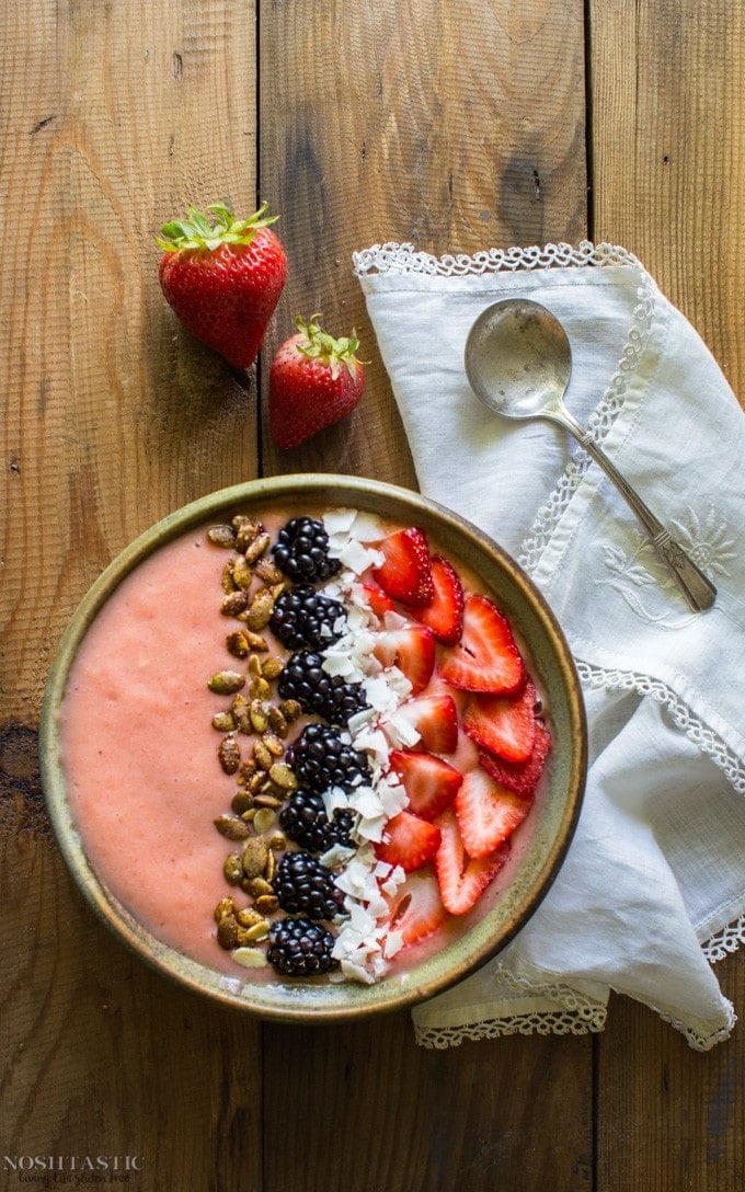 A nutrient dense Strawberry Pineapple Smoothie Bowl that's a perfect way to start your day! It's Vegan, Gluten Free, Paleo.