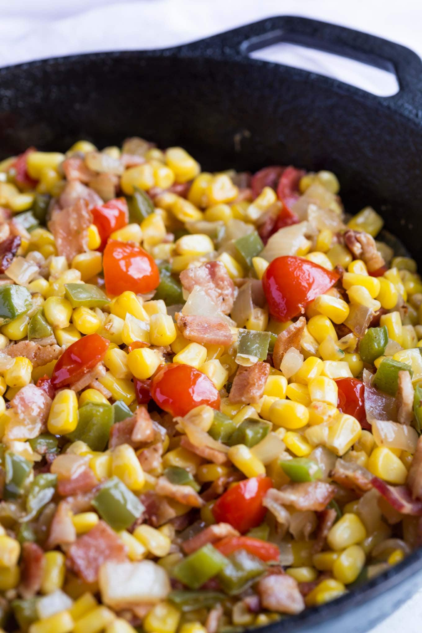 Corn Maque Choux is a classic cajun and southern side dish that's simple to make and packed with flavor, it's gluten free too!