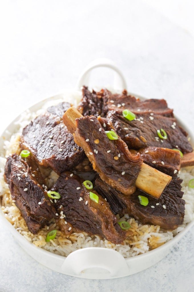 Tasty, tender Pressure Cooker Korean Beef Short Ribs! They are fall apart tender, taste delicious and are easily made in your Instant Pot or other electric pressure cooker. This recipe is gluten free. 