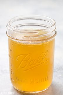 homemade chicken broth in a mason jar