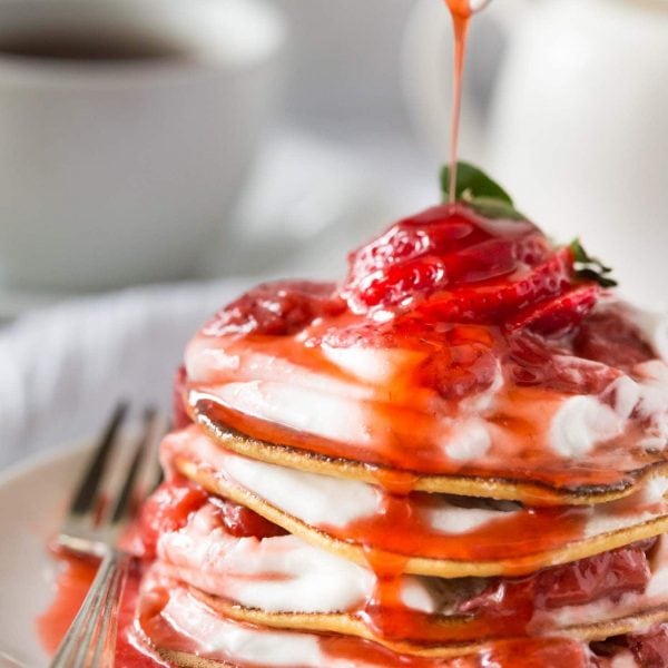 Delicious Low Carb Paleo Crepes with Strawberry sauce and Coconut Whipped Cream made in 15 minutes! Dairy Free, Gluten Free, Paleo and Grain Free.