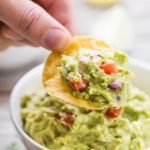 Quick and easy Guacamole, SO much tastier store bought! Gluten Free, dairy free, vegan, vegetarian, paleo, primal, and Whole 30 compliant.