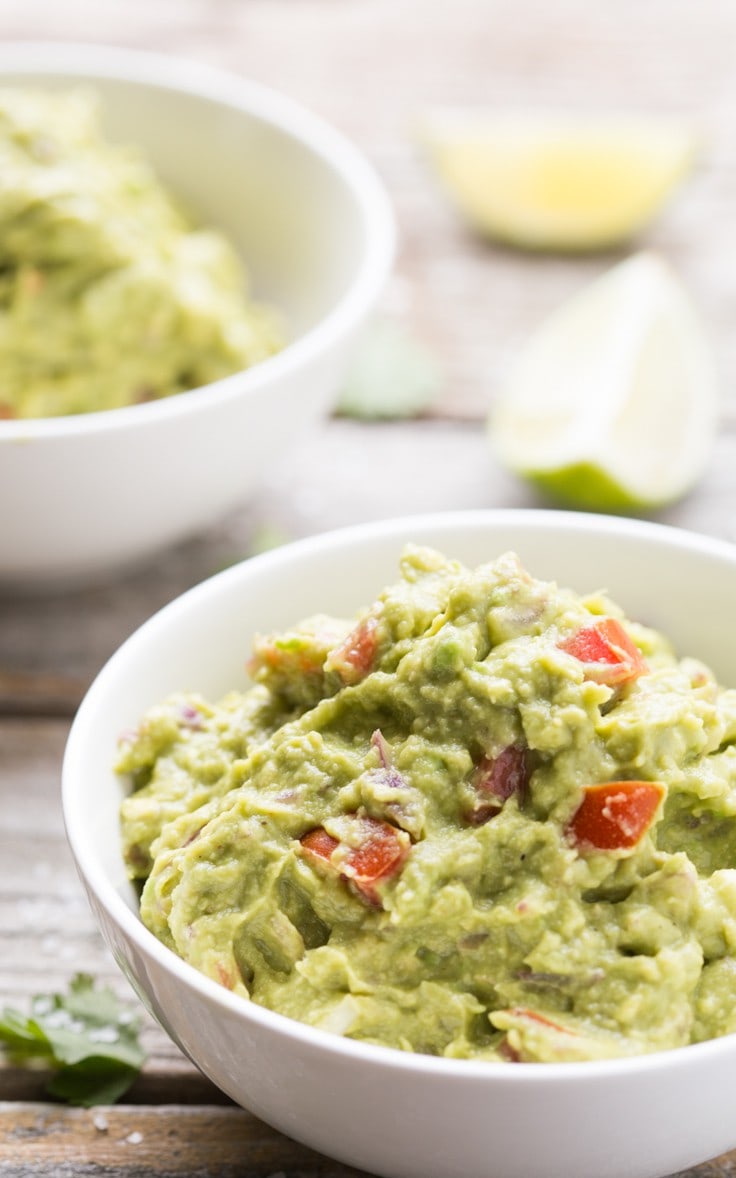 Quick and easy Guacamole, SO much tastier than store bought! Gluten Free, dairy free, vegan, vegetarian, paleo, primal, and Whole 30 compliant.