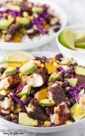 Healthy fresh gluten free Fish Taco Bowls recipe! Cook it in minutes and serve over rice with generous helpings of Avocado, Black Beans and fresh vegetables | Noshtastic.com