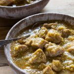 Pressure Cooker Paleo Chile Verde recipe with roasted tomatillos, garlic, onion, and tender pieces of pork that melt in your mouth! it's Gluten Free and Whole30 too.