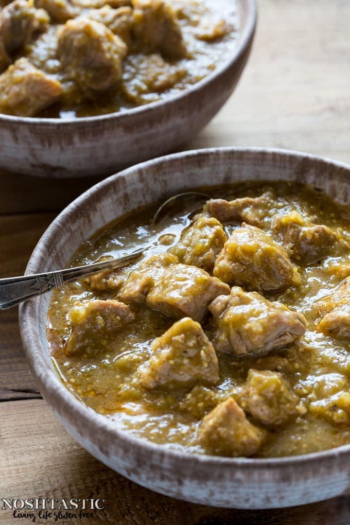 Easy Paleo Chili Verde recipe with roasted tomatillos, garlic, onion, and tender pieces of pork that melt in your mouth! it's Gluten Free and Whole30 too.
