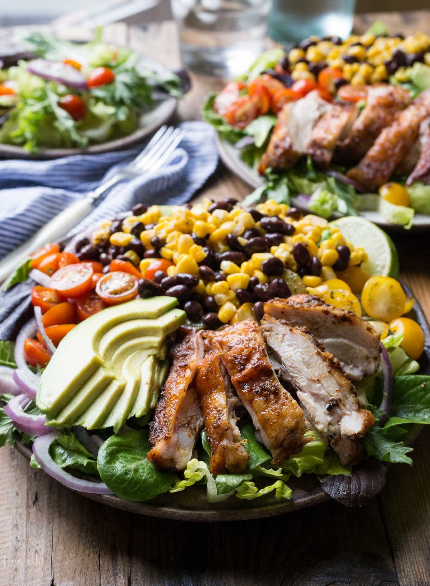 Southwest Chicken Salad with corn, beans, red onion, avocado, with Cilantro Lime Dressing