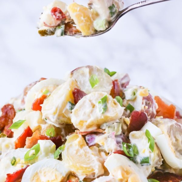 You guys!! This is the BEST Potato Salad with Bacon and Egg recipe ever!! It's loaded with yummy bacon, egg and pickle, so, so good!! | This recipe is gluten free, you can make it paleo and whole30 , full details in the recipe | noshtastic.com