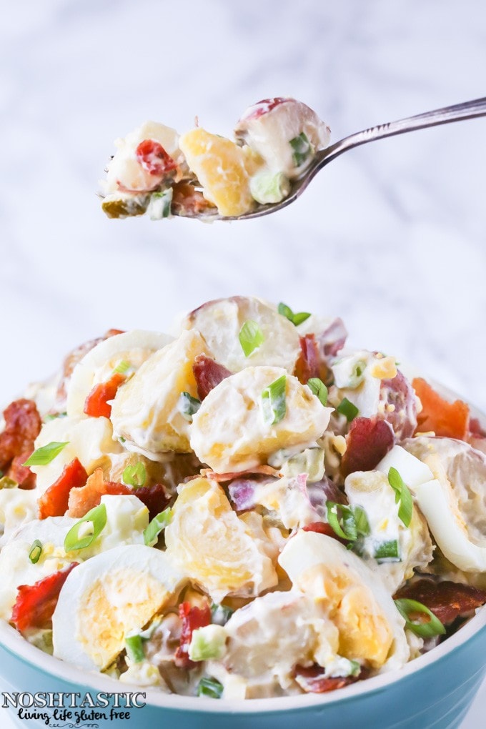 You guys!! This is the BEST Potato Salad with Bacon and Egg recipe ever!! It's loaded with yummy bacon, egg and pickle, so, so good!! | This recipe is gluten free, you can make it paleo and whole30 , full details in the recipe | noshtastic.com