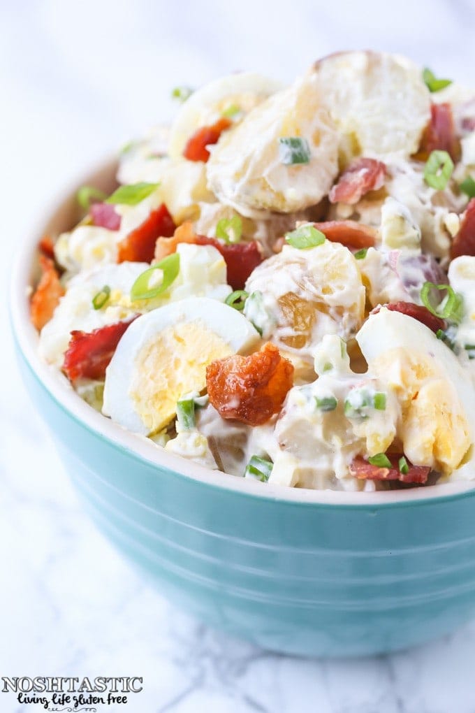 You guys!! This is the BEST Potato Salad with Bacon and Egg recipe ever!! It's loaded with yummy bacon, egg and pickle, so, so good!! | This recipe is gluten free, you can make it paleo and whole30 , full details in the recipe | noshtastic.com