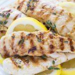 Low carb Grilled Paleo Lemon Chicken with Thyme, delicious and bursting with fresh herbs and garlic! Cook on an indoor cast iron grill pan or outdoor grill.