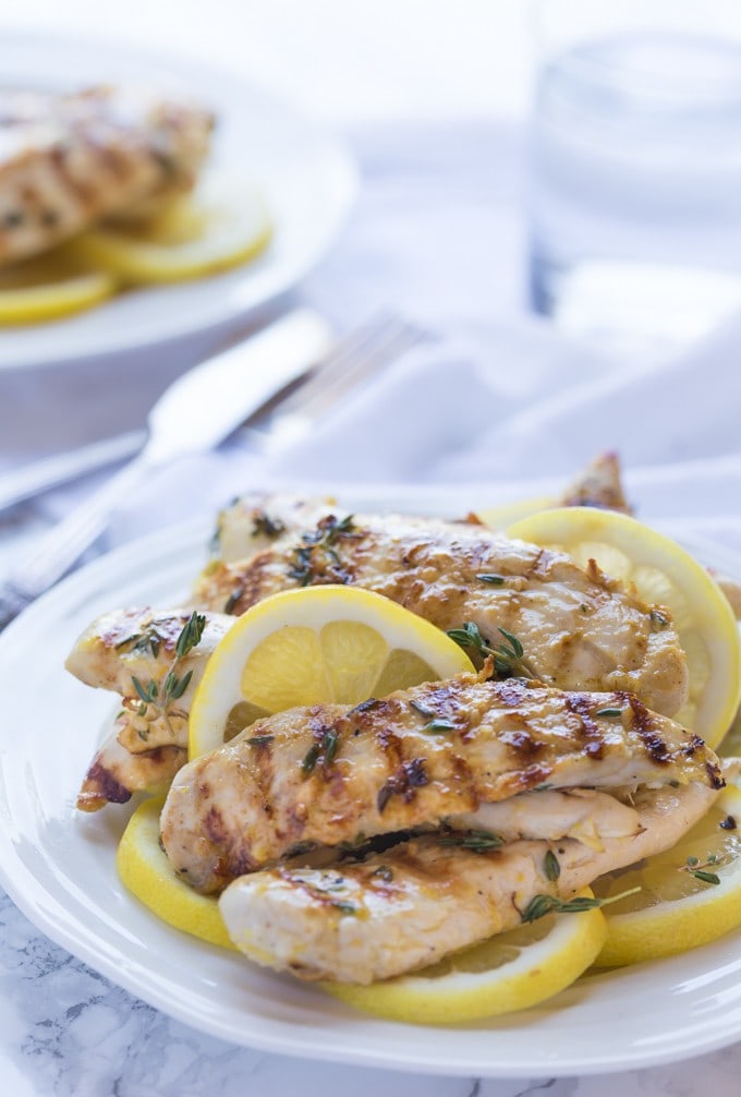 Low carb Grilled Paleo Lemon Chicken with Thyme, delicious and bursting with fresh herbs and garlic! Cook on an indoor cast iron grill pan or outdoor grill.