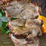 A deliciously tasty Cuban Pork roast that is fall of the bone tender! Marinaded in a combination or warm spices, subtle herbs, lime and orange juice, this pork roast will melt in your mouth! It's Paleo, Whole30 and Gluten Free.