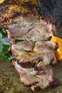 A deliciously tasty Cuban Pork roast that is fall of the bone tender! Marinaded in a combination or warm spices, subtle herbs, lime and orange juice, this pork roast will melt in your mouth! It's Paleo, Whole30 and Gluten Free.