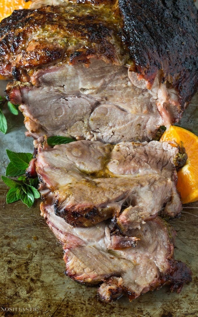 A deliciously tasty, healthy, Cuban Pork roast that is fall of the bone tender! Marinaded in a combination of warm spices, subtle herbs, lime and orange juice, this pork roast will melt in your mouth! It's Paleo, Whole30 and Gluten Free.