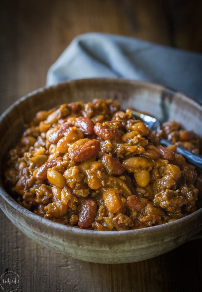 Best BBQ Baked Beans with Beef, this is hands down the most popular recipe I've made all year, so, so tasty! Also known as Cowboy Beans or Southern Baked Beans | gluten free and dairy free | from noshtastic.com