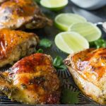 Easy baked Cilantro Lime Chicken with Garlic! Made with a Cilantro, Honey, Allspice, Lime, Chili Flakes and Garlic marinade, this is a Paleo recipe with a Whole 30 option.