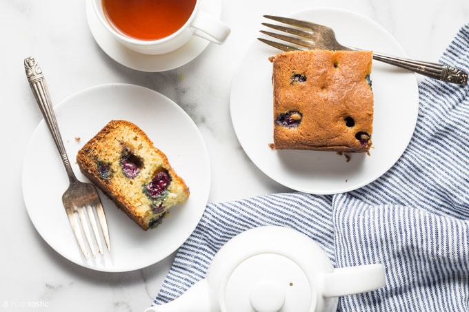 gluten free blueberry cake with cup of tea on a table