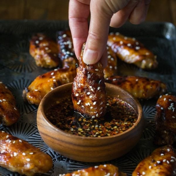 Paleo Slow Cooker Sticky Chicken Wings are MELT in your MOUTH good, cook them in your crockpot in just a few hours! Easy and healthy, gluten free appetizer, perfect game day and party food