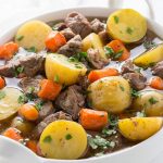 Pressure cooker Irish stew is an adaptation of a classic recipe with lamb, potatoes, carrots and herbs. It's gluten free, paleo and whole30, perfect for your Instant Pot.