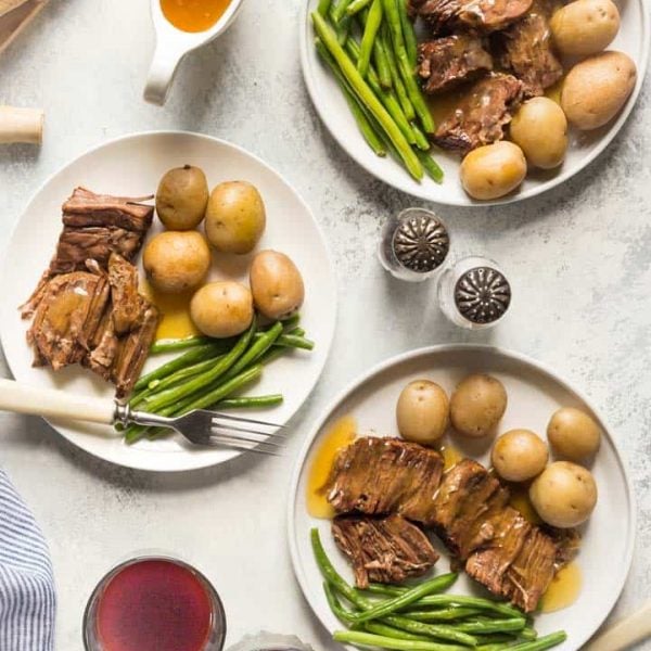 My Paleo Pot Roast is a firm family favorite and I think you'll love it too! I have instructions on how to cook it in the oven, slow cooker, and pressure cooker. #paleo #whole30 #paleorecipe