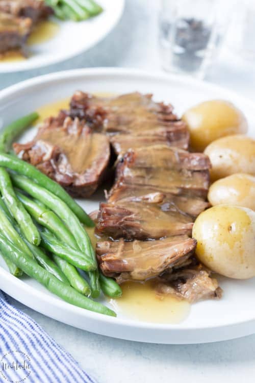 My Paleo Pot Roast is a firm family favorite and I think you'll love it too! I have instructions on how to cook it in the oven, slow cooker, and pressure cooker.