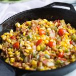 Corn Maque Choux is a classic cajun and southern side dish that's simple to make and packed with flavor, it's gluten free too!