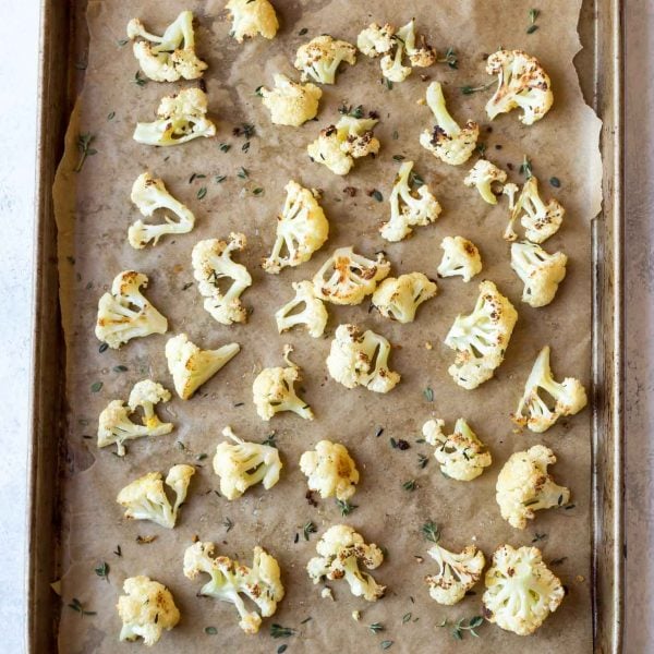 Paleo Roasted Cauliflower with Lemon,Thyme and Garlic, make it easily in the oven! This recipe is also Whole30, vegan and low carb.