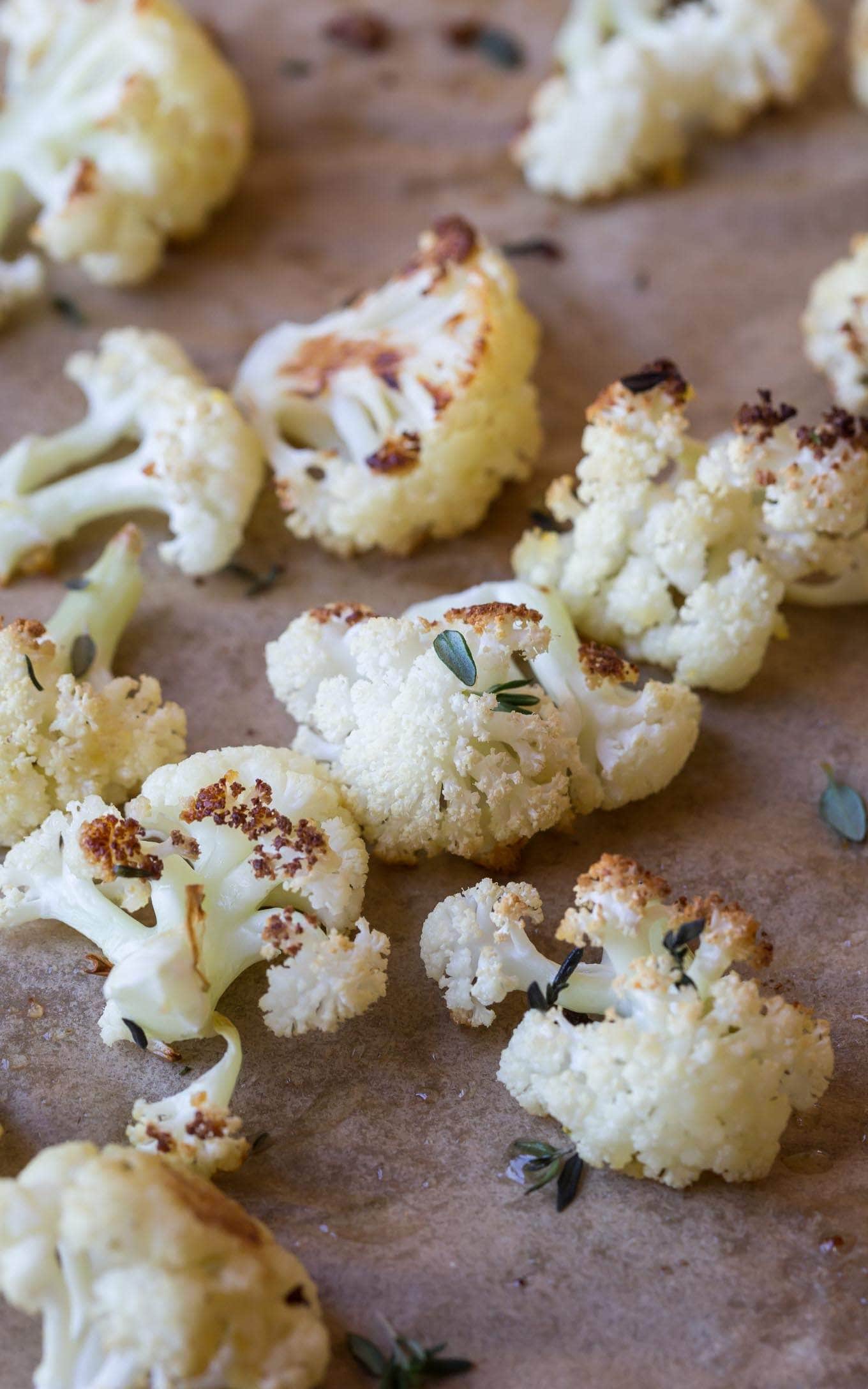  Paleo Roasted Cauliflower with Lemon,Thyme and Garlic, make it easily in the oven! This recipe is also Whole30, vegan and low carb.