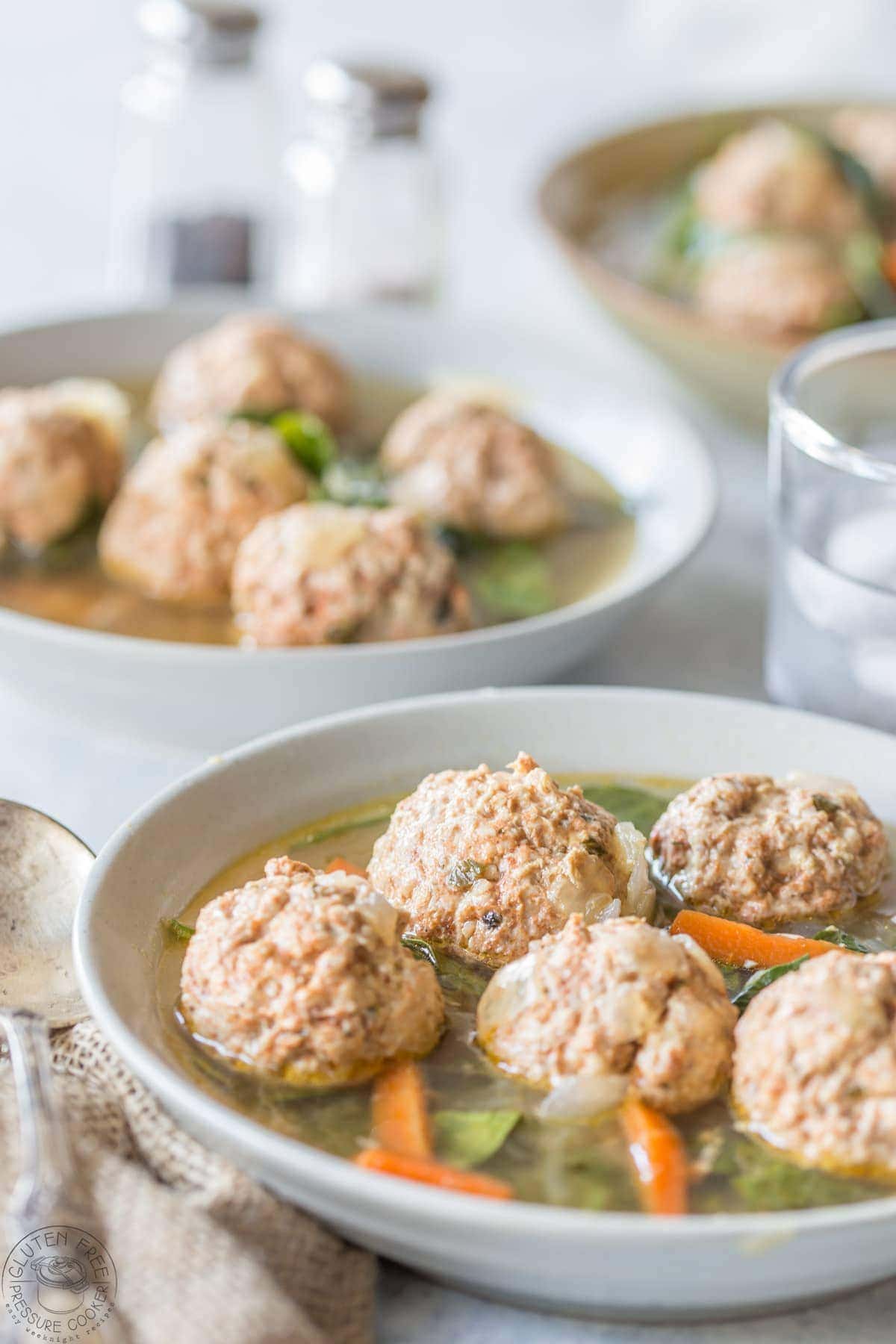 Pressure Cooker Italian Wedding Soup, this recipe is gluten free, paleo, Whole30, low carb and healthy, and is perfect to make in your Instant Pot or any other electric pressure cooker!