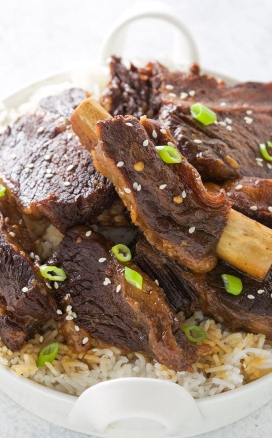 Tasty, tender Pressure Cooker Korean Beef Short Ribs! They are fall apart tender, taste delicious and are easily made in your Instant Pot or other electric pressure cooker. This recipe is gluten free. 