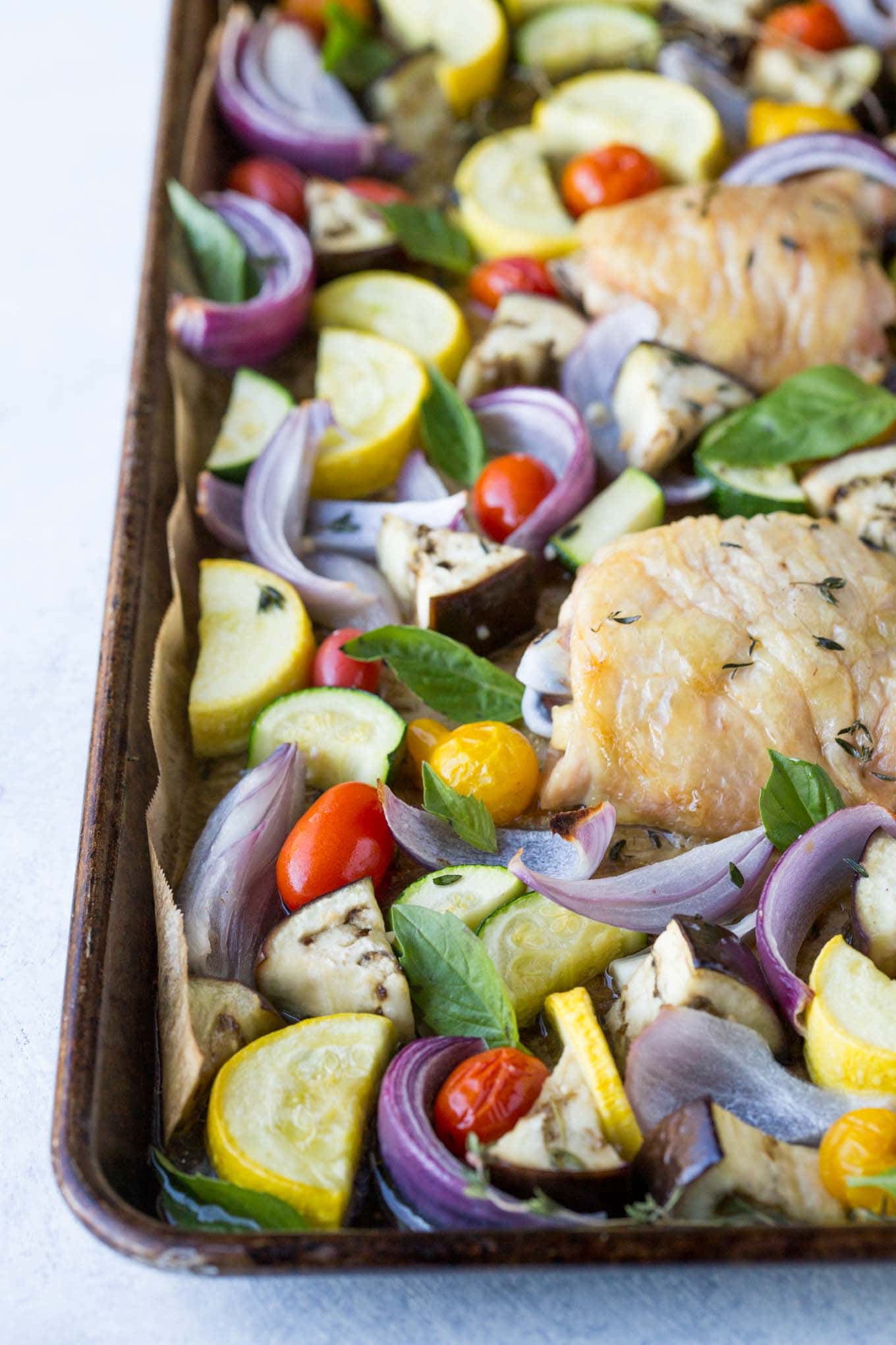 Sheet pan Chicken with Roasted Ratatouille! This healthy one pan meal is gluten free, paleo, whole30, and low carb.