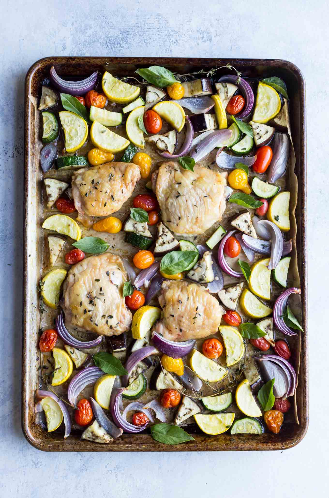 Sheet pan Chicken with Roasted Ratatouille! This healthy one pan meal is gluten free, paleo, whole30, and low carb.