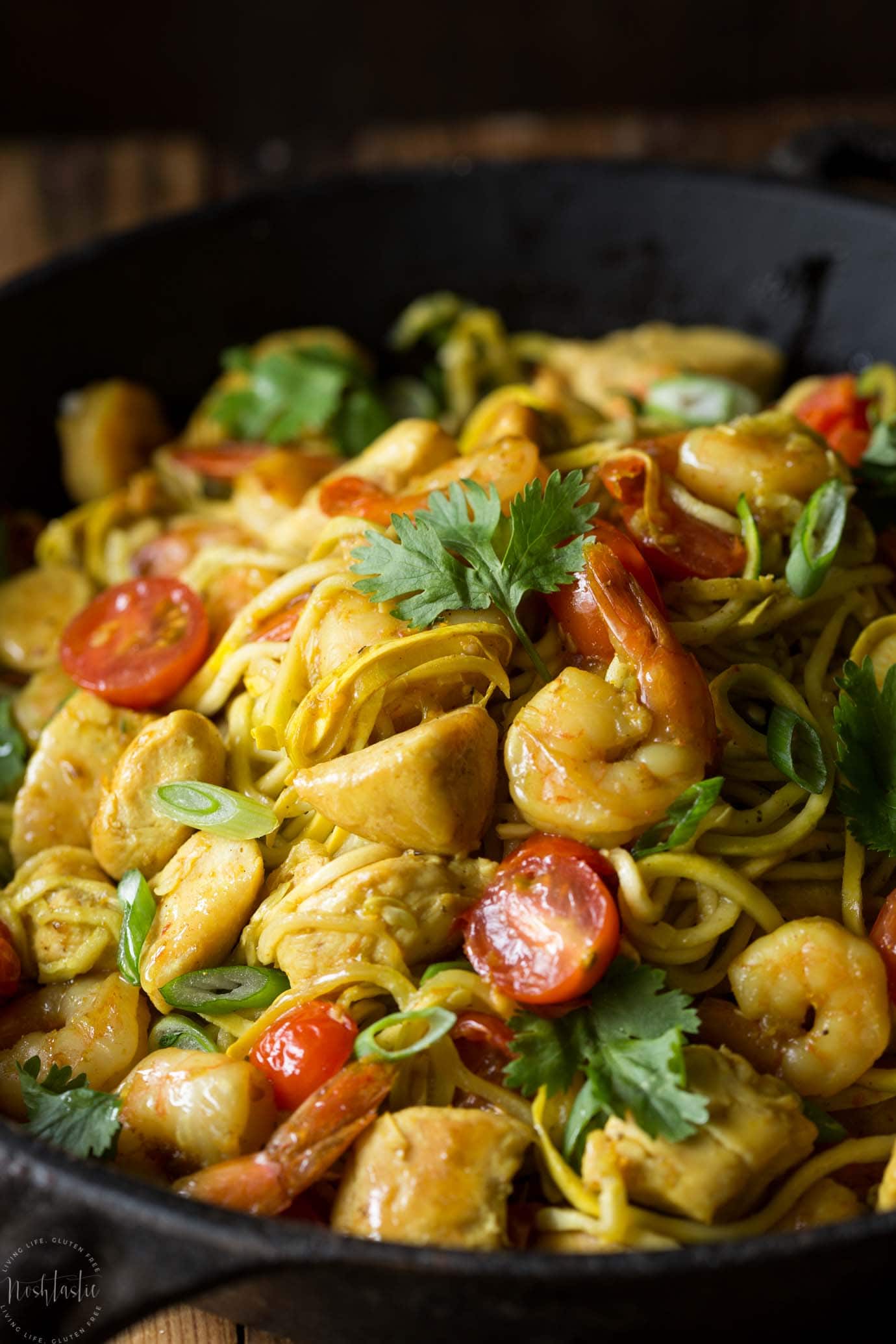 Paleo Singapore Noodles, made with zucchini noodles - zoodles , shrimp, chicken and tasty mild curry flavored sauce with added turmeric! This Singapore street noodles recipe is packed with authentic flavors, it is Gluten free, healthy, low carb with Whole30. If you're looking for a PF Chang's Street Noodles recipe to make at home, this is it!