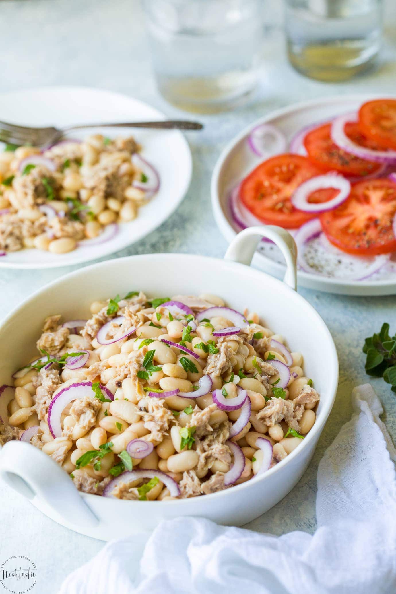 You'll love my Tuna White Bean Salad with Red Wine vinegar dressing, and no mayo! It's packed full of protein and contains, tuna, white beans and fresh parsley. A really healthy, gluten free, low calorie lunch or dinner option, this salad is ready to eat in less than 5 Minutes!