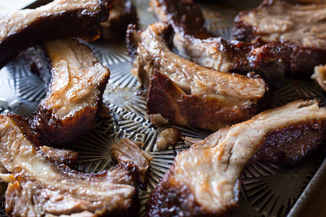 Slow Cooker Baby Back Ribs that are fall off the bone tender, delicious with a Memphis style rub and easy homemade BBQ sticky sauce!