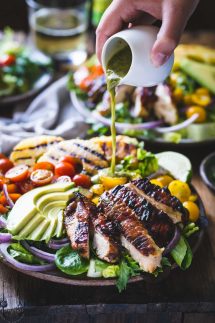 Cilantro Lime Chicken Salad with dressing being poured on top