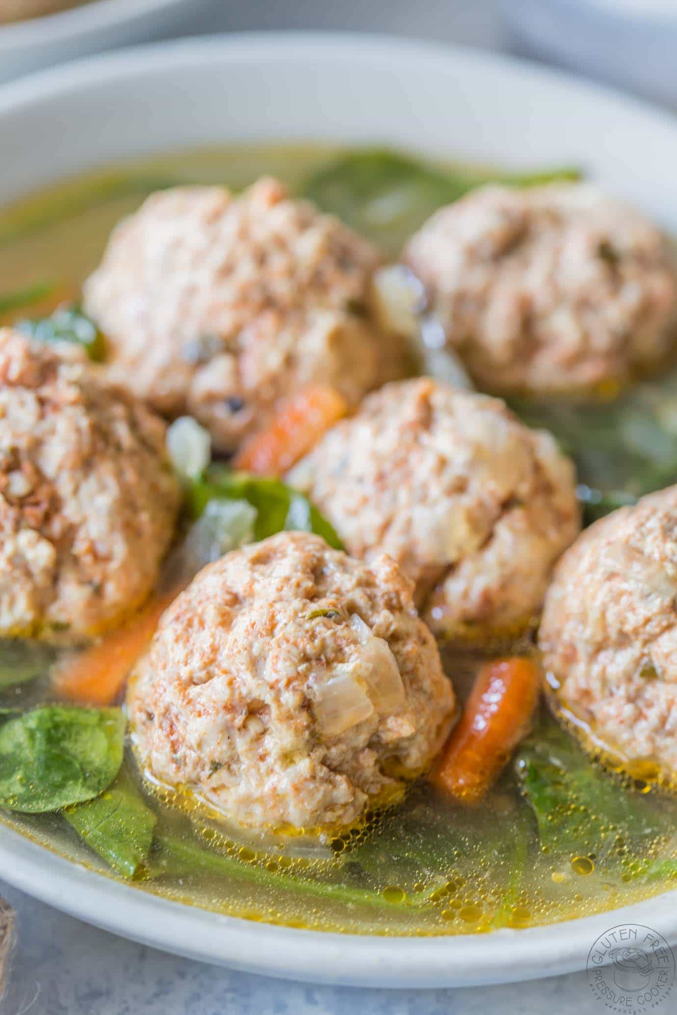 Easy pressure cooker Italian Wedding Soup, this recipe is gluten free, paleo, Whole30, low carb and healthy, and is perfect to make in your Instant Pot or any other electric pressure cooker!