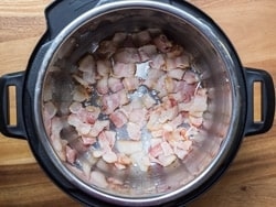 Bacon cooking in a pressure cooker