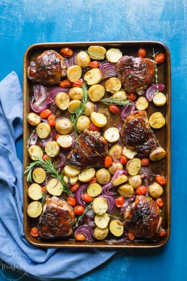 You need to try my delicious, easy, sheet pan Paleo Balsamic Chicken recipe with Roasted Potatoes, Red Onion, Tomatoes & fresh herbs! You can cook it on one pan in the oven in an hour or less!