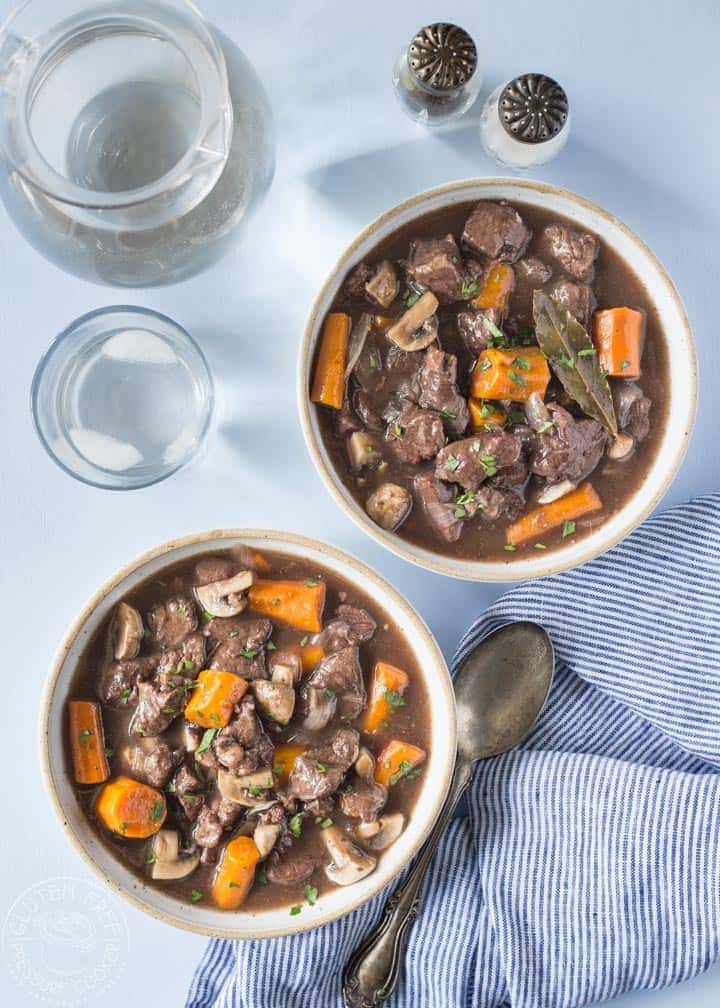 Easy and delicious Pressure Cooker Beef Bourguignon recipe made with beef, onions, garlic, mushrooms and red wine. Also known as Beef Burgundy. You can cook this in your electric pressure cooker or instant pot. It's gluten free and can be made paleo or whole30. 