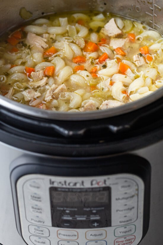 chicken noodle soup in a pressure cooker