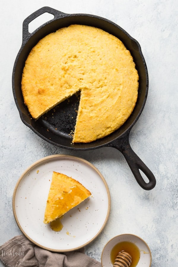 gluten free cornbread recipe from scratch, an easy skillet cornbread recipe you bake in a cast iron skillet #glutenfreecornbread #glutenfreebread #glutenfreebaking #glutenfreerecipe #noshtastic #glutenfree