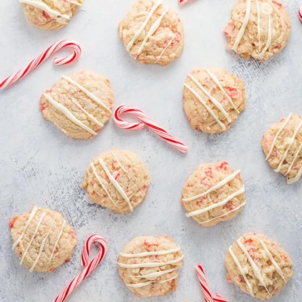 gluten free white chocolate chip cookies with peppermint and crushed candy canes! Perfect holiday cookies for Christmas and easy to make. #glutenfreecookies #christmascookies #glutenfree #sugarcookies