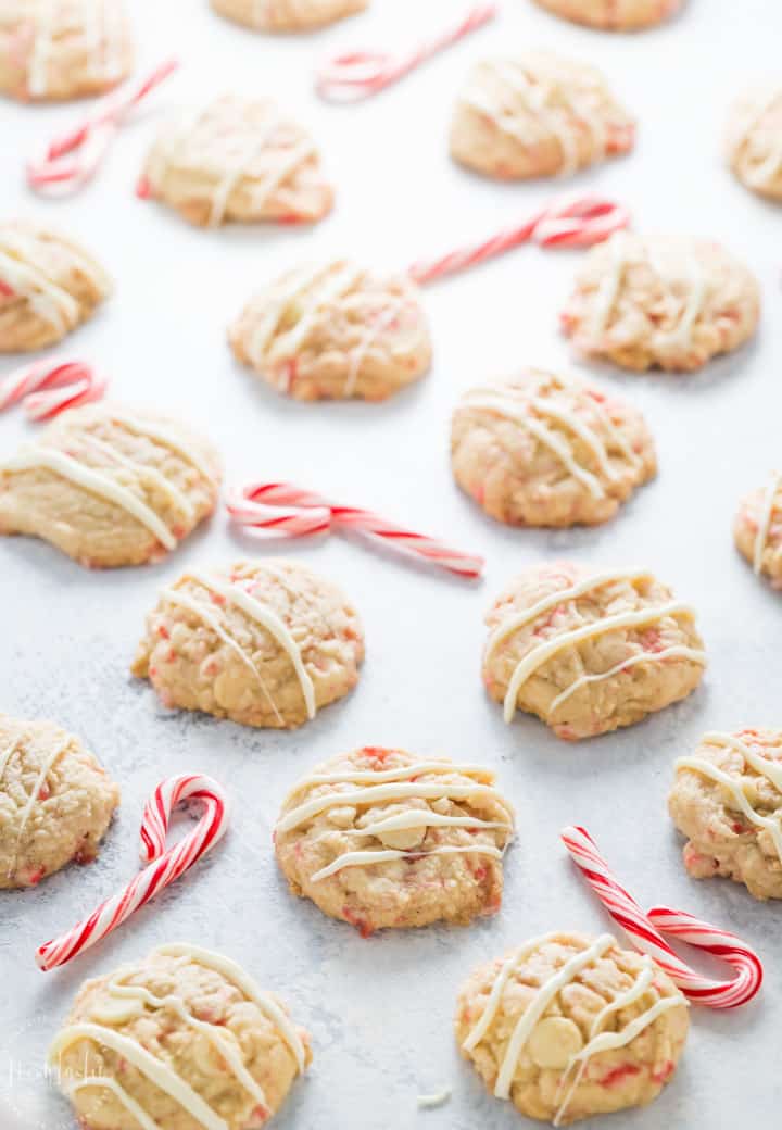 gluten free white chocolate chip cookies with peppermint and crushed candy canes! Perfect holiday cookies for Christmas and easy to make. #glutenfreecookies #christmascookies #glutenfree #sugarcookies