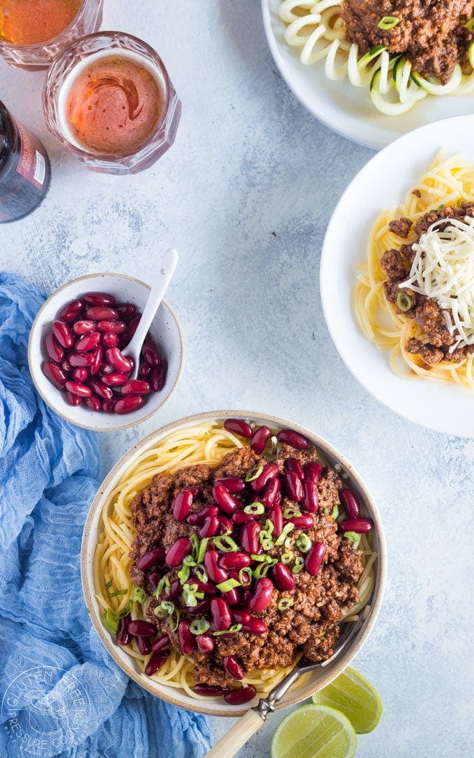 Pressure Cooker Cincinnati Chili is a chili of different kind with an usual flavor combination that really works! It's a breeze to make this in your Instant Pot or electric pressure cooker | www.noshtastic.com| #cincinattichili #instantpotchili #pressurecookerchili #instantpot #groundbeefchili #instapot #electricpressurecooker #glutenfreepressurecooker #glutenfreeinstantpot #glutenfree 