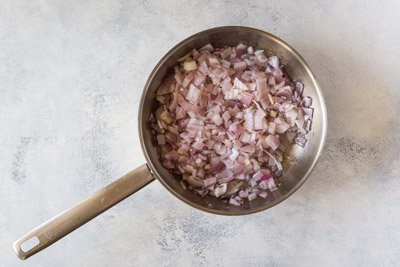 red onions in a pan