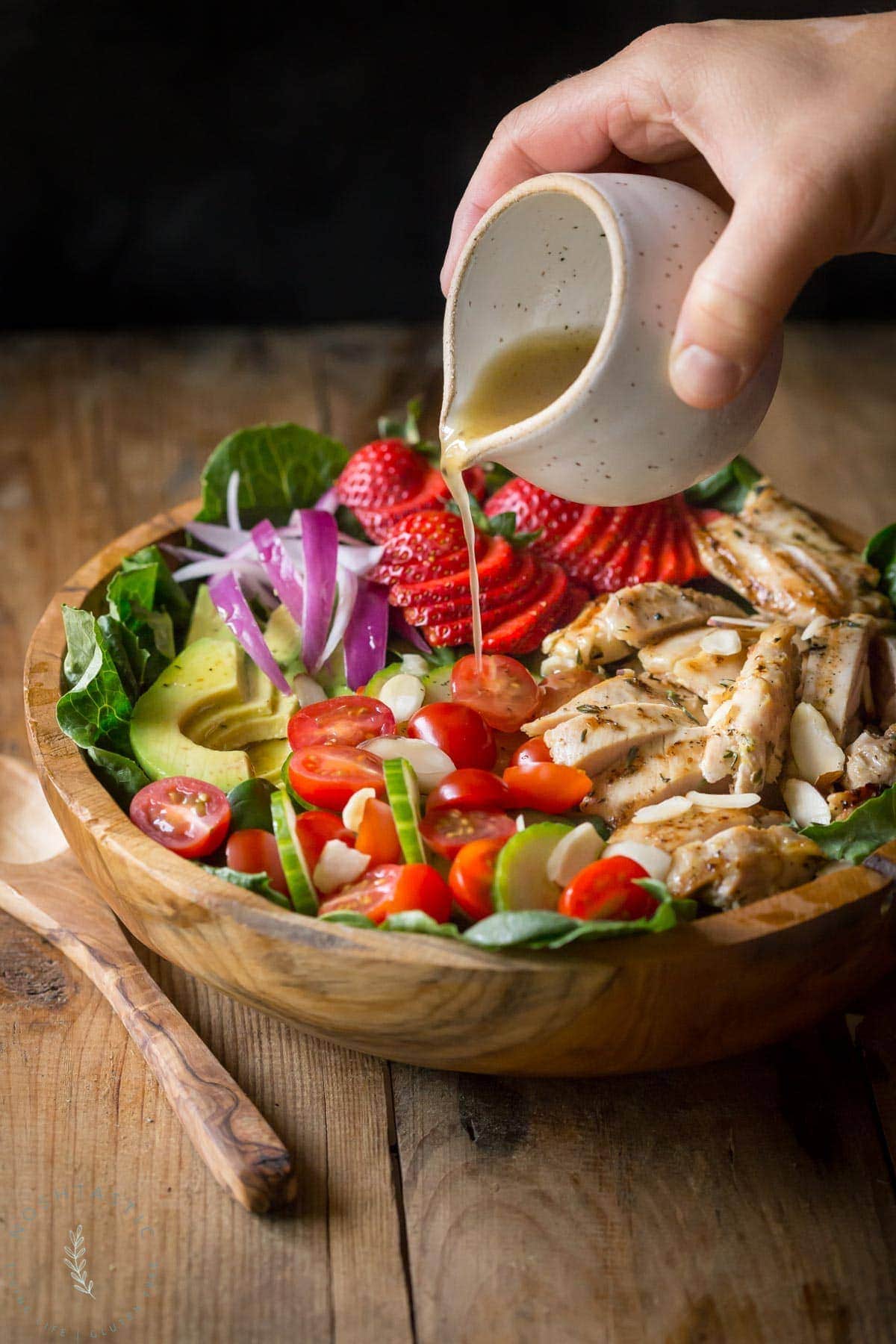 My Grilled Chicken Salad has all sorts of fabulous ingredients including, chicken marinated in garlic and fresh thyme, strawberries, almonds and is topped with an apple cider vinaigrette dressing. | www.noshtastic.com | #grilledchickensalad #chickensalad #grilledchicken #paleochickensalad #paleochicken #paleosalad #glutenfreesalad #glutenfree #noshtastic #glutenfreerecipe 
