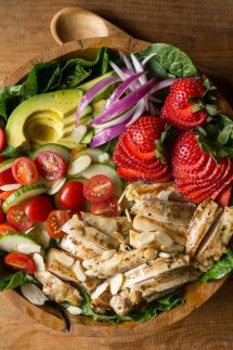 My Grilled Chicken Salad has all sorts of fabulous ingredients including, chicken marinated in garlic and fresh thyme, strawberries, almonds and is topped with an apple cider vinaigrette dressing. | www.noshtastic.com | #grilledchickensalad #chickensalad #grilledchicken #paleochickensalad #paleochicken #paleosalad #glutenfreesalad #glutenfree #noshtastic #glutenfreerecipe
