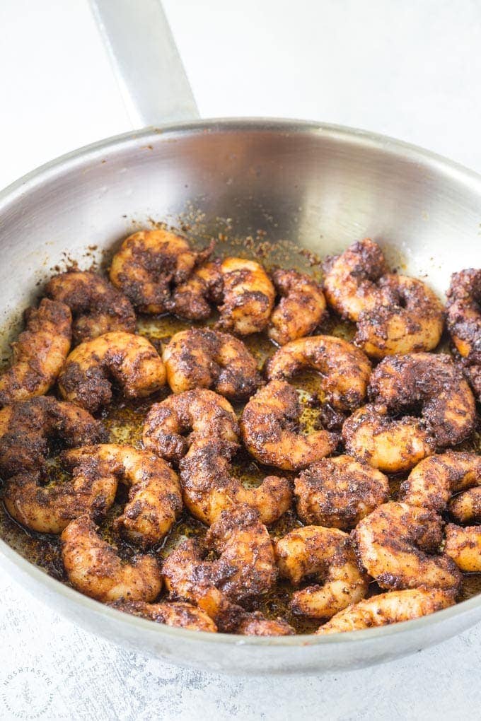 blackened shrimp in a skillet